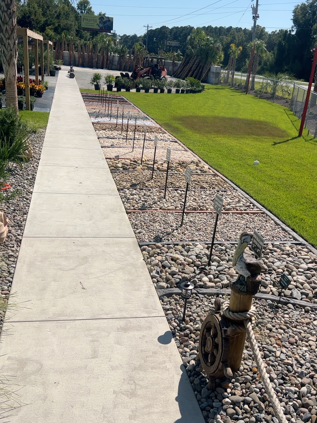 Outdoor rock display with labeled landscape stone samples at My Yard Center
